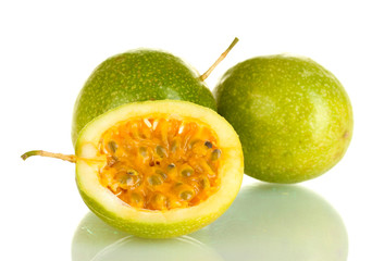 green passion fruit isolated on white background close-up