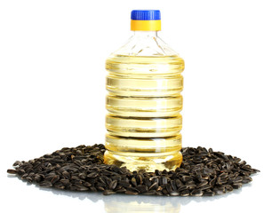 sunflower oil with sunflower seeds isolated on white background