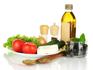 Ingredients for a Greek salad isolated on white background