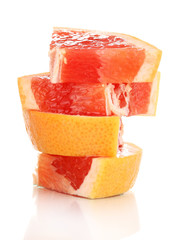 Sliced grapefruit isolated on white