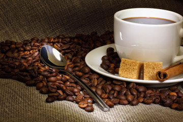 Coffee beans and white cup