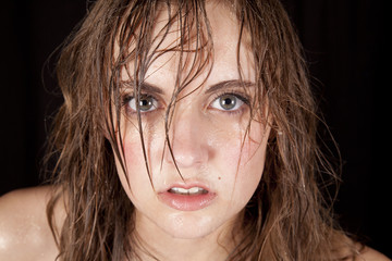 woman wet hair very serious