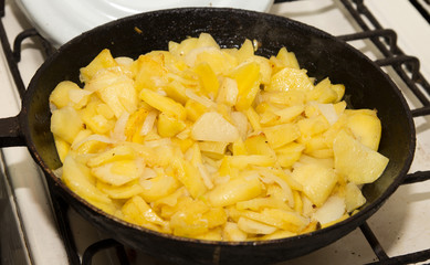 Roast the potatoes in a pan