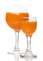 Tropical juices in glasses isolated on white
