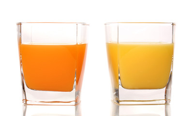 Tropical juices in glasses isolated on white