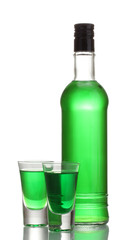 bottle and two glasses of absinthe isolated on white