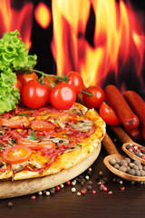 delicious pizza, salami, tomatoes and spices
