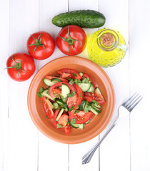 Fresh salad with tomatoes and cucumbers