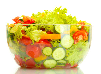 fresh vegetable salad in transparent bowl isolated on white