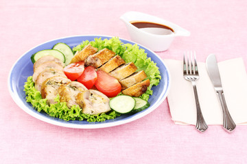 Tasty meat cutlet with garnish on plate