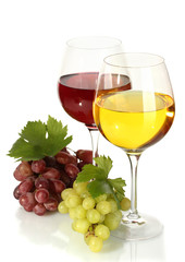 glasses of wine and ripe grapes isolated on white