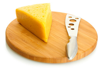 tasty cheese and knife on wooden cutting board isolated on