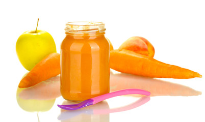 Jar with fruit and vegetables  baby food and spoon isolated