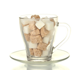 white refined sugar and Lump brown cane sugar cubes in glass