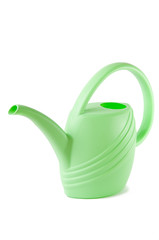 Standard plastic green watering can, isolated on white
