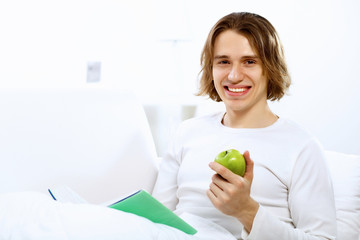 Young man with notebook