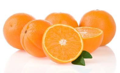 orange fruit and slices isolated on white