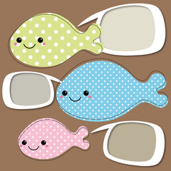 Three cute, smiling fishes with polkadot pattern and speech bubb