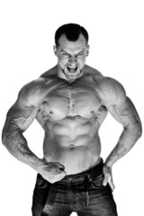 Muscular male bodybuilder on white background