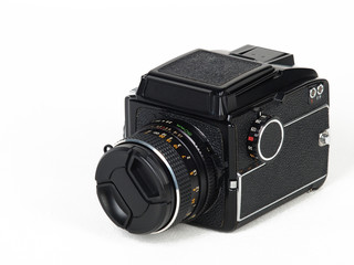Medium format camera isolated on white background.
