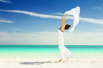 happy woman with white sarong