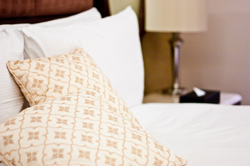 Fototapeta na wymiar Pillows in Hotel bedroom