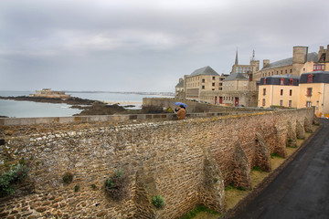 Tourists on the defensive wall of Saint Malo
