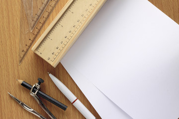 paper note with a group of accessory on wooden background