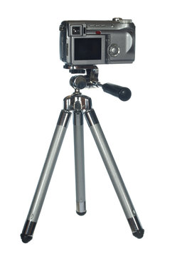 professional digital camera on a tripod , isolated on white back