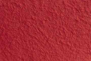 textured paper with a fibrous look, red