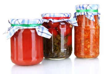Jars with canned vegetables isolated on white