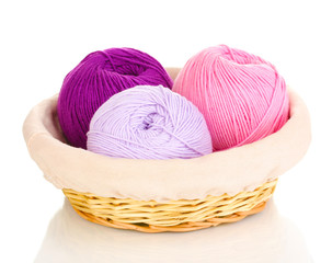 Knitting yarn in basket isolated on white