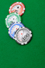 Gaming chips on the green cloth