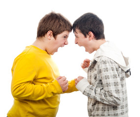 Two teenage boys screaming at each other