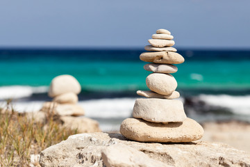 Balanced stones near the beach. Formentera island. Spain.