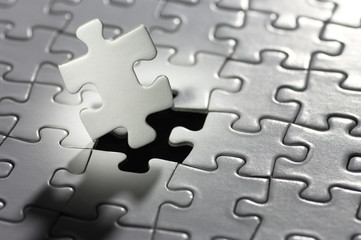 Fototapeta premium Illuminated puzzle piece.(horizontal)