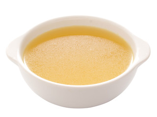 close up of a bowl of chicken broth