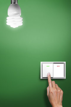 hand pressed to switch to turn on the light.