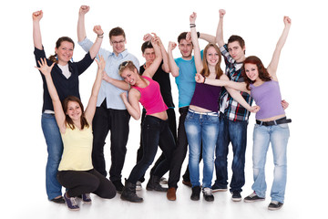 Happy group of people with arms up - isolated over white