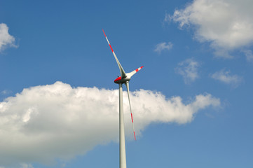 Wind turbine against beatiful sky.