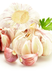 Fresh garlic with parsley isolated on white