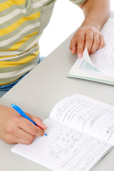 A young guy studying, isolated on white