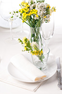 Festive table setting in yellow