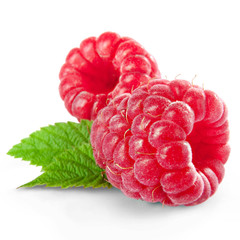 raspberries with leaves isolated on white background