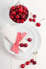 decoration with fresh flowers and sweet cherry