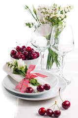 decoration with fresh flowers and sweet cherry
