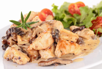 grilled meat with cream and mushrooms
