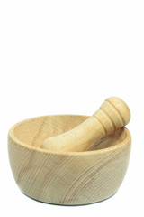 A wooden morter and pestle on white background copy space