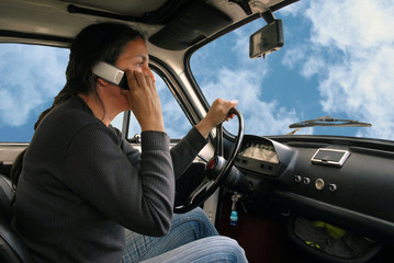 Naklejka premium Téléphoner au volant