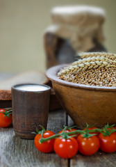 Composition of milk on the bread, the old background